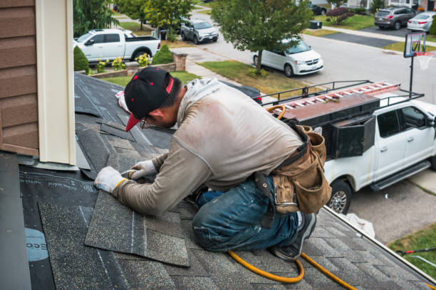 Professional Flat Roof Repair technician working in Eagle, MI